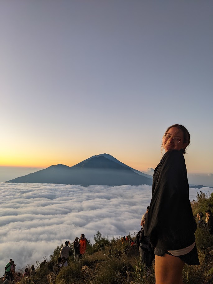 Things to do in Ubud - girl at sunrise during the Mount Batur hike