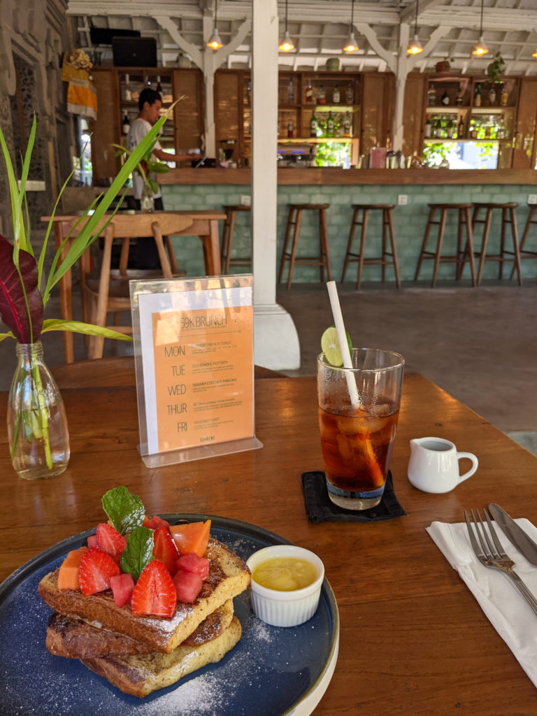 French toast on a wooden table in one of the best restaurants in Ubud